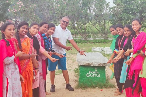 At FarmGuru, children enjoy themselves on the field — they plough, plant the paddy saplings, swiftly throw seeds and are finally rewarded with a waterfall bath at the farm.