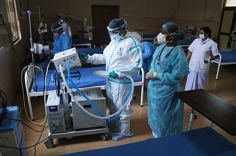 Health workers wearing personal protective equipment take part in a mock drill at a government chest clinic in Puducherry on Tuesday. (Photo | Sriram R, EPS)