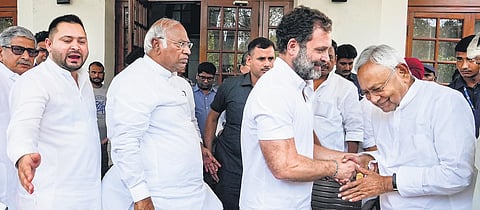Congress leader Rahul Gandhi greets Bihar Chief Minister Nitish Kumar at party president Mallikarjun Kharge’s residence, in New Delhi on Wednesday. (Photo | PTI)