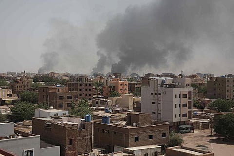 Smoke rises from a central neighborhood of Khartoum, Sudan, Sunday, April 16, 2023, after dozens have been killed in two days of intense fighting. (File Photo | AP)