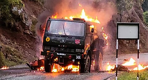 An army vehicle catches fire after being struck by lightning in the Bhatadurain area of Mendhar in Poonch district.(Photo | PTI)