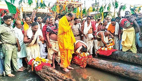 Priests consecrating timber logs at the chariot construction yard on Sunday | Express