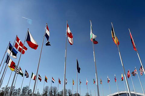 The national flags of countries member of the NATO fly outside the organisation headquarters in Brussels on April 3, 2023. (Photo | AFP)