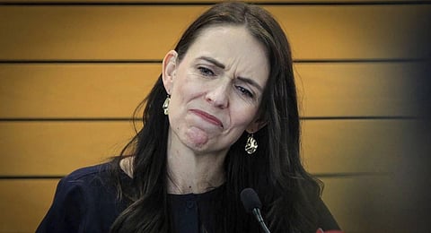 FILE: New Zealand Prime Minister Jacinda Ardern grimaces as she announces her resignation at a press conference in Napier, New Zealand Thursday. (Photo | AP)