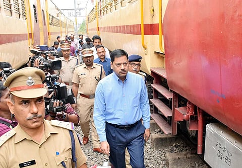 Railway Protection Force Southern Zone IG M Eswara Rao inspecting the D1, D2 coaches, where the arson attack took place on Sunday night. | Express