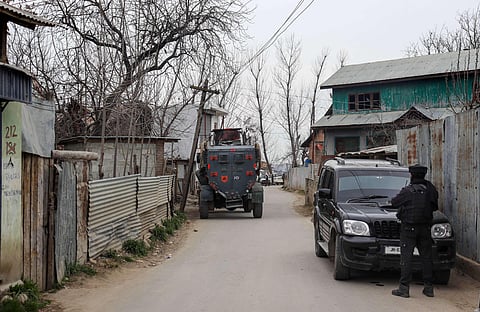 A security personnel stands guard after terrorists attack. (Photo | PTI)