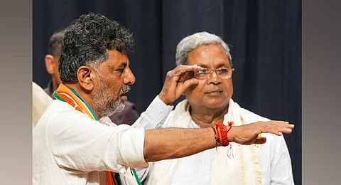 Former Karnataka CM Siddaramaiah and Karnataka Congress President D.K. Shivakumar during celebrations after the party's win in Karnataka Assembly elections. (Photo | PTI)