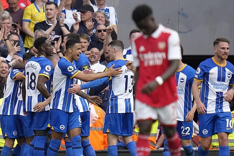 Brighton's players celebrate after scoring their goal during the EPL match between Arsenal and Brighton and Hove Albion at Emirates Stadium in London, Sunday, May 14, 2023. (Photo | AP)