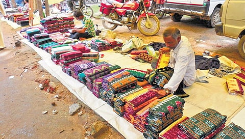 Weavers selling their products in the open market which functions on Wednesdays and (Inset) the unused Bunakar Bazaar complex | Express