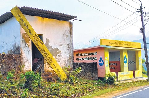 The toilet at Bank Pady on the Nenmara–Nelliampathy roadside between Kaikatty and Pulayampara which lies closed