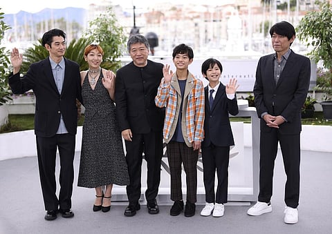 Eita Nagayama, from left, Sakura Ando, Hirokazu Koreeda, Soya Kurokawa, Hinata Hiiragi, and Yuji Sakamoto for 'Monster' at the 76th international film festival, Cannes. (Photo | AP)