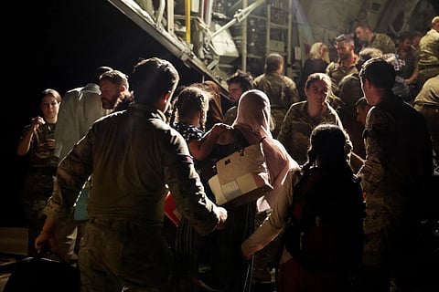The last evacuees and military personnel board an RAF aircraft bound for Cyprus from Wadi Seidna Air Base in Sudan, April 29, 2023. ( Photo | AP )
