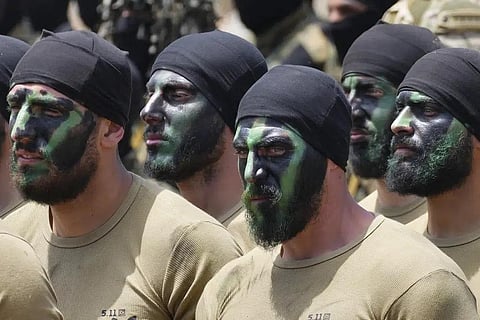 Fighters from the Lebanese militant group Hezbollah carry out a training exercise in Aaramta village in the Jezzine District, southern Lebanon, Sunday, May 21, 2023. (Photo | AP)
