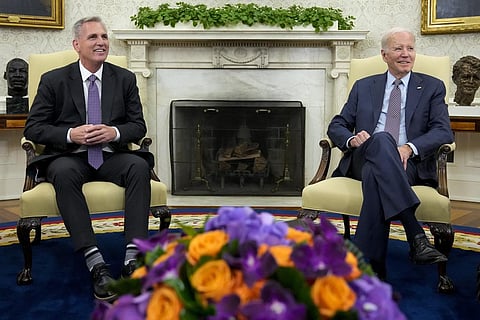 US President Joe Biden meets with House Speaker Kevin McCarthy to discuss the debt limit in the Oval Office of the White House, Monday, May 22, 2023, in Washington. (Photo | AP)