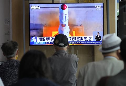 A TV screen shows a file image of North Korea's rocket launch during a news program at the Seoul Railway Station in South Korea on May 31 (Photo | AP)