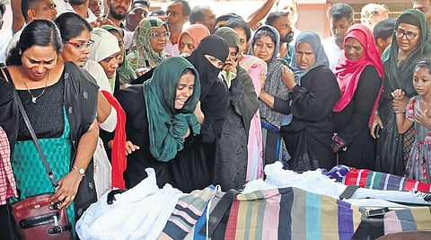 Relatives and residents are inconsolable as bodies of 11 members of a family, who were among the 22 people killed in the Tanur boat tragedy, are kept at Parappanangadi in Malappuram for the public to