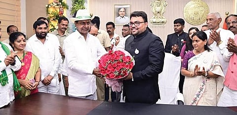 Chief Minister K Chandrasekhar Rao presents a bouquet to Mancherial Collector B Santhosh after inaugurating the Integrated Collector office building on Friday