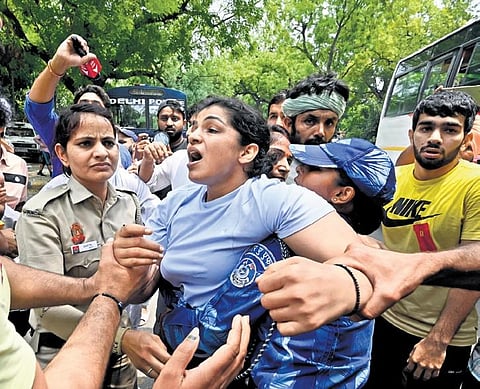 Bajrang Punia, Sakshi Malik and Vinesh Phogat, all of whom have been demanding Singh’s arrest for a couple of months during a protest in Delhi. (Photo | EPS)