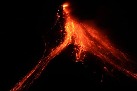 Lava flows down the slopes of Mayon volcano as seen from Daraga town, Albay province, northeastern Philippines, Tuesday, June 13, 2023. (Photo | AP)