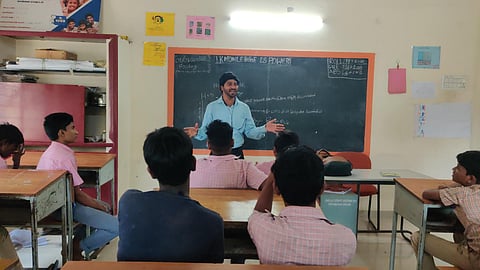 K Haridas, a volunteer from PRISM Trust, taking classes for juvenile students.
