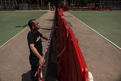 Richard Tsoi, former leader of the now-disbanded Hong Kong Alliance in Support of Patriotic Democratic Movements of China at Victoria Park in Hong Kong. (Photo | AP)