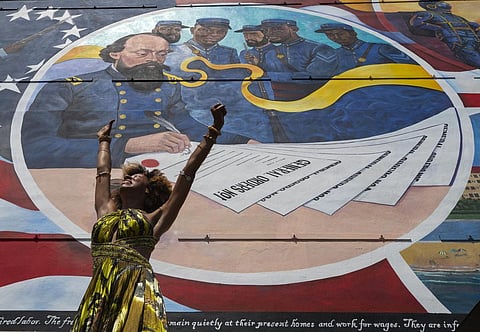 Dancer Prescylia Mae performs in Galveston, Texas, on June 19, 2021, to mark Juneteenth, the day that enslaved Black Americans learned they were free. (AP)