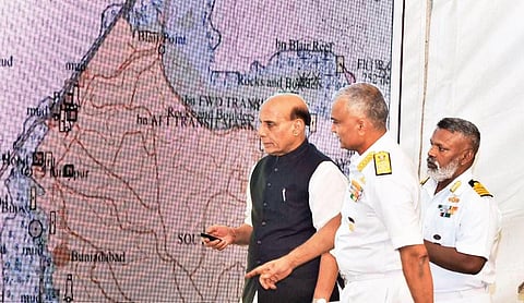 Defence Minister Rajnath Singh releasing the hydrography map on the occasion of World Hydrography Day at Kochi Naval Base on Tuesday. Chief of Naval Staff Admiral R Harikumar is also seen | A Sanesh