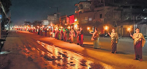 Women form a human chain to protest against the ongoing ethnic violence in Manipur (Photo | PTI)