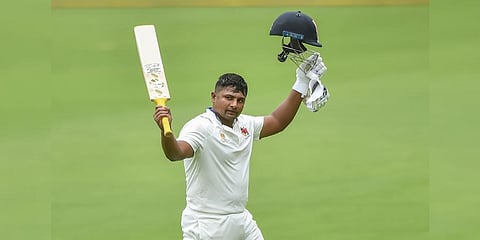 FILE - Mumbai batter Sarfaraz Khan celebrates after scoring a century during a Ranji Trophy game. (Photo | PTI)