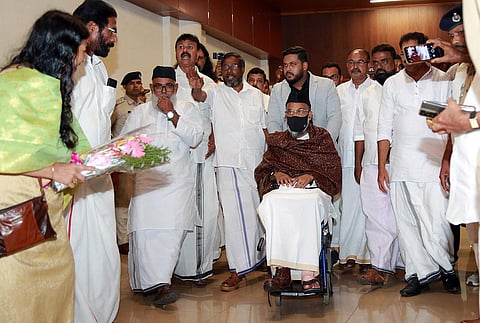 PDP chairman Abdul Nasar Madani who arrived in the state on Monday after six years greets his party workers who reached the Kochi airport to welcome him. (Photo | T P Sooraj, EPS)