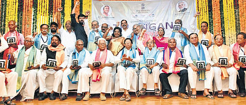 Governor Tamilisai Soundararajan poses for a photo with 30 veterans of the 1969 Telangana movement at Raj Bhavan on Friday