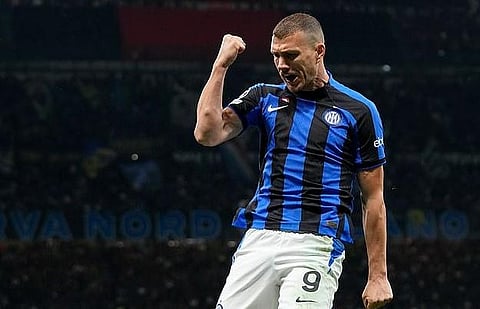 Inter Milan's Edin Dzeko celebrates after scoring his side's opening goal during the Champions League semifinal first leg soccer match between AC Milan and Inter Milan at San Siro. (Photo | AP)