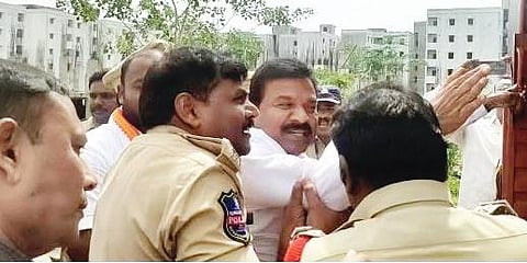 Police take DCC president Kavvampalli Satyanaraya into custody in Karimnagar on Sunday
