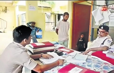 Sanjiv Barman speaking to the cops at Shahdol’s Dhanpuri police station | Express