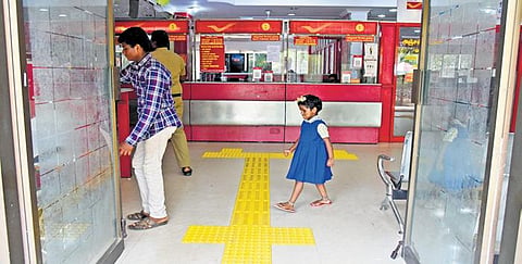 The Tiruchy head post office is the first post office in TN to introduce tactile flooring and Braille signages | m k ashok kumar