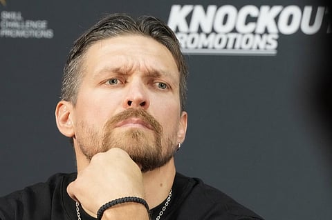 Ukrainian soccer club Polissya Zhytomyr said Thursday July 20, 2023, it has signed unbeaten heavyweight champion Oleksandr Usyk to play for the team for one season. (Photo | AP)