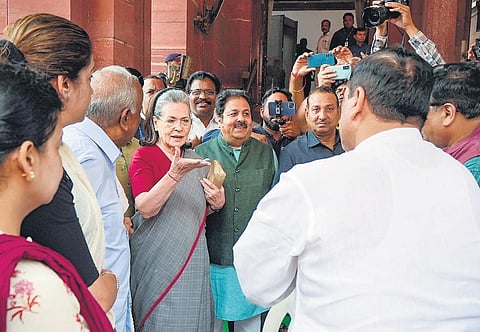 Congress MP Sonia Gandhi meets AAP MP Sanjay Singh on her arrival at Parliament House during the monsoon session on Wednesday | PTI