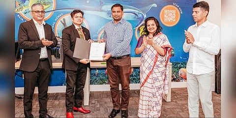 President and CEO of BayEcotarium George Jacob handing over the LoI to IT Minister Tusharkanti Behera in the presence of 5T secretary VK Pandian| Express