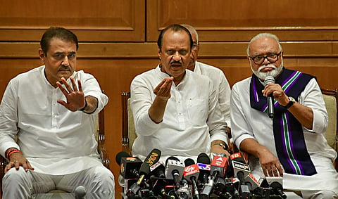Newly sworn-in Maharashtra Deputy CM Ajit Pawar (C) with NCP leaders Chhagan Bhujbal (R) and Praful Patel during a press conference, in Mumbai, Sunday, July 2, 2023. (Photo | PTI)
