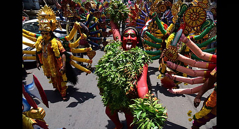 Bhagyanagar Sri Mahankali Jatara Bonala Utsavala Ummadi Committee members take out a procession at Durga Temple in Vijayawada. (Photo | Express)