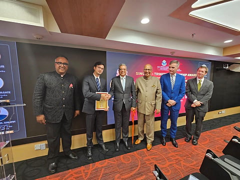 Justice P S Narasimha hands over Singhvi-Trinity-Cambridge Scholarship Award 2023 to Jai Chander Brunner (Photo| Special Arrangement)