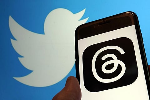 Logos for Twitter and meta's new app Threads. (Photo | AP)