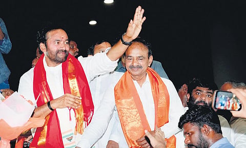 Newly-appointed BJP State president G Kishan Reddy waves to the crowd. (Photo | EPS)