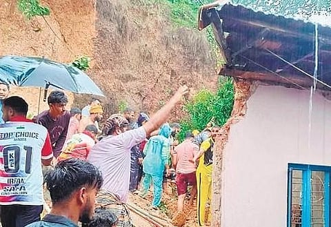 Locals and rescue personnel at the site in Bantwal taluk