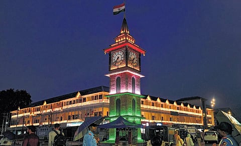 Clock Tower lit on the eve of Independence Day at Lal Chowk, in Srinagar on Monday. (Photo | PTI)