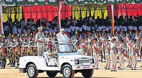 Chief Minister Siddaramaiah inspects a guard of honour during the 77th Independence Day celebrations at Manekshaw Parade Ground in Bengaluru on Tuesday.