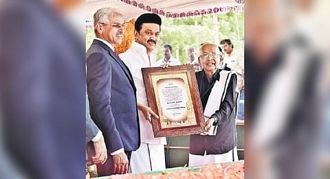 K Veeramani receiving Thagaisal Thamizhar Award from CM MK Stalin