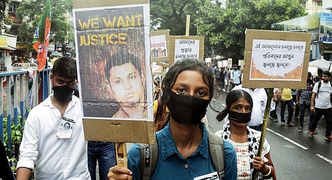 People from the Bagula village of deceased Swapnadeep Kundu, first-year student of Jadavpur University, take part in a rally to protest his unnatural death.(Photo | ANI)