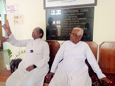 Fr Kuriakose Mundadan and Fr Sebastian Thalian staging a hunger strike in the parlour of Mount St Thomas in Kakkanad on Tuesday. (Photo | Express)