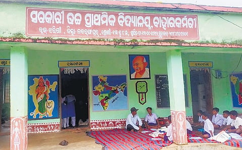 Classes being held on the verandah of the school. (Photo | Express)
